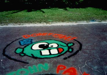 Dopefish Graffiti on Sidewalk